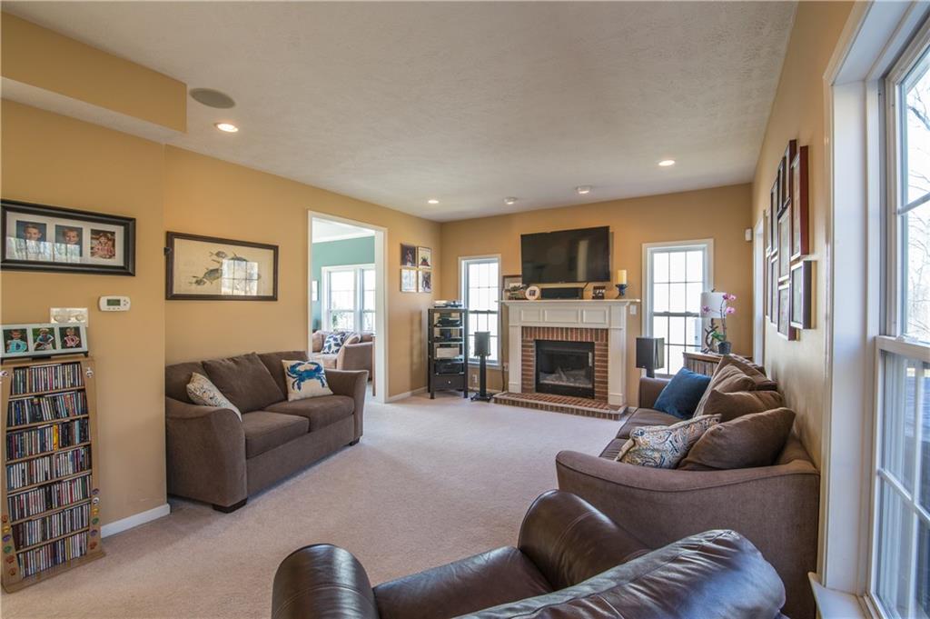 5009 Venice Road Pittsburgh, PA 15209 - Photo 8 of 25 Large family room with gas fireplace. Recessed lighting and two added windows.