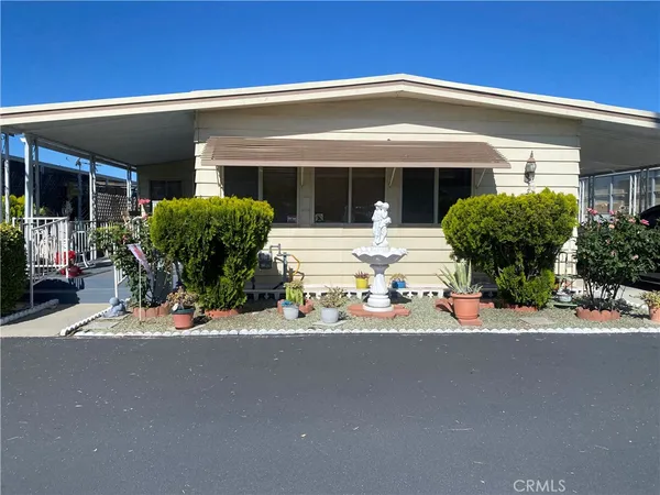 front view of a house with a small yard