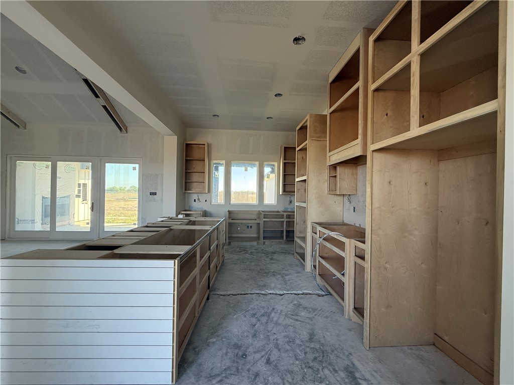 1501 Mariposa Ranch Corpus Christi, TX 78413 - Photo 3 of 4 a kitchen with a stove and a sink