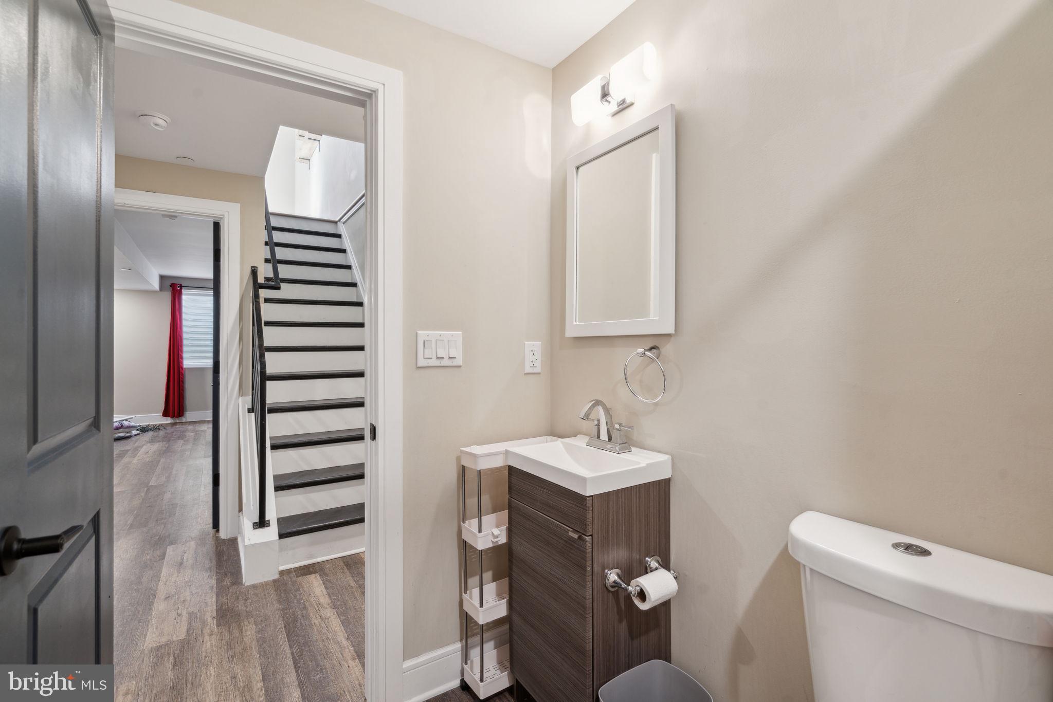 518 Mercy Street Philadelphia, PA 19148 - Photo 46 of 50 Modern half-bath with sleek finishes.