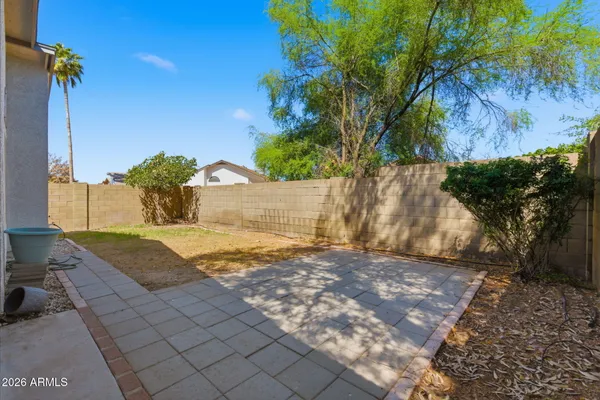 a view of swimming pool with a yard