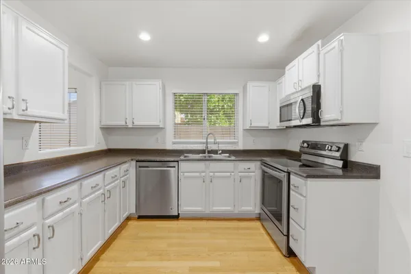 a view of a kitchen with a sink