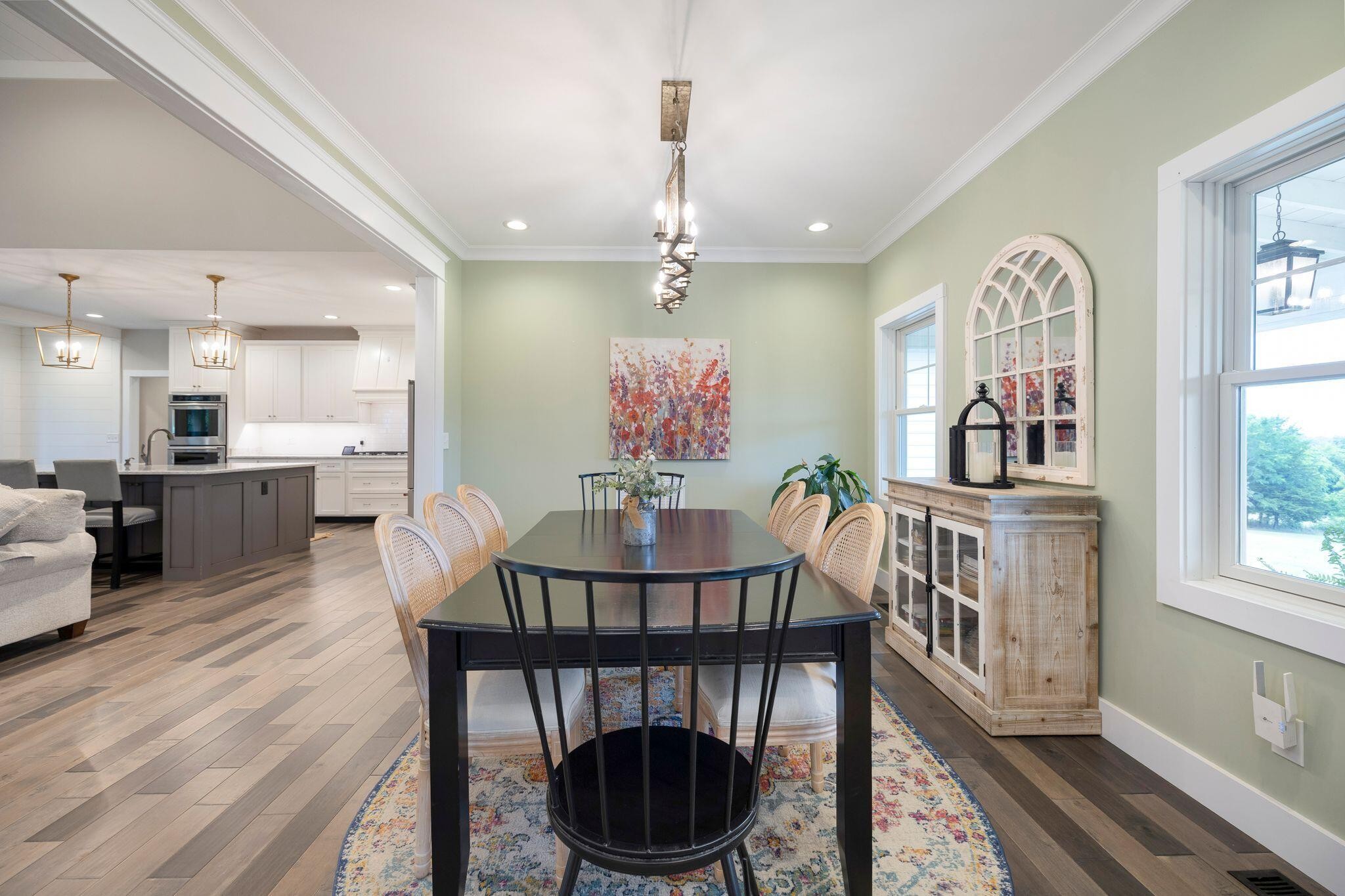 6866 Daus Mountain Road Whitwell, TN 37397 - Photo 10 of 49 a view of a dining room with furniture window and wooden floor