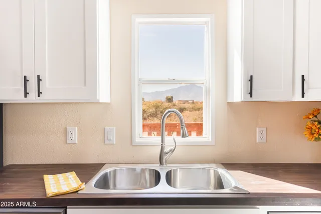 a view of a balcony with a patio