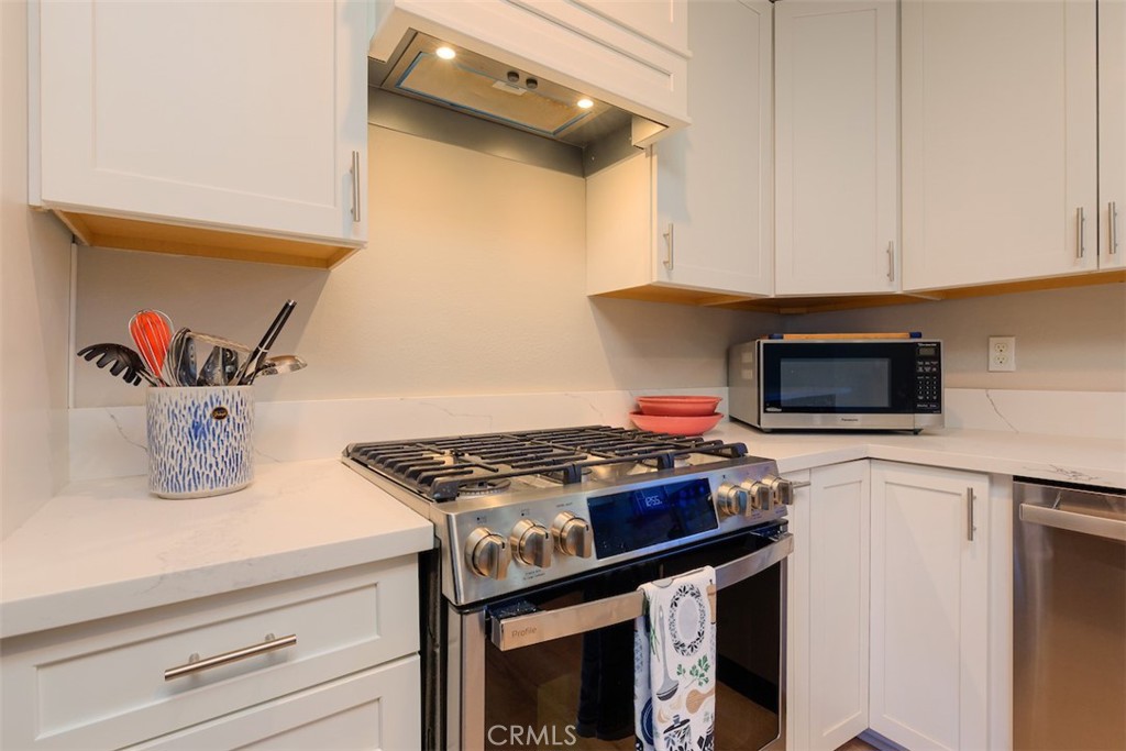 1274 Filbert Avenue Chico, CA 95926 - Photo 14 of 52 a kitchen with a stove and a microwave