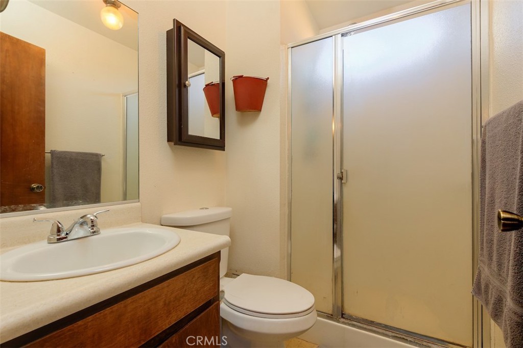1274 Filbert Avenue Chico, CA 95926 - Photo 22 of 52 a bathroom with a sink a toilet and shower