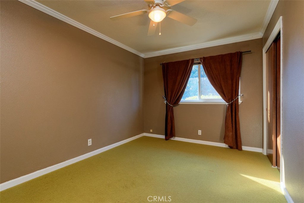 1274 Filbert Avenue Chico, CA 95926 - Photo 24 of 52 an empty room with windows and fan