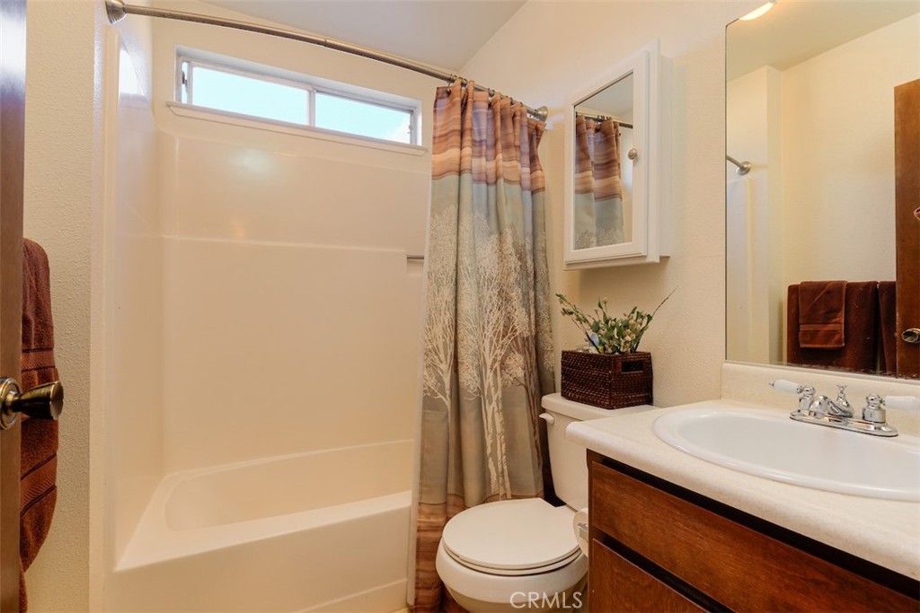 1274 Filbert Avenue Chico, CA 95926 - Photo 25 of 52 a bathroom with a sink a toilet and shower