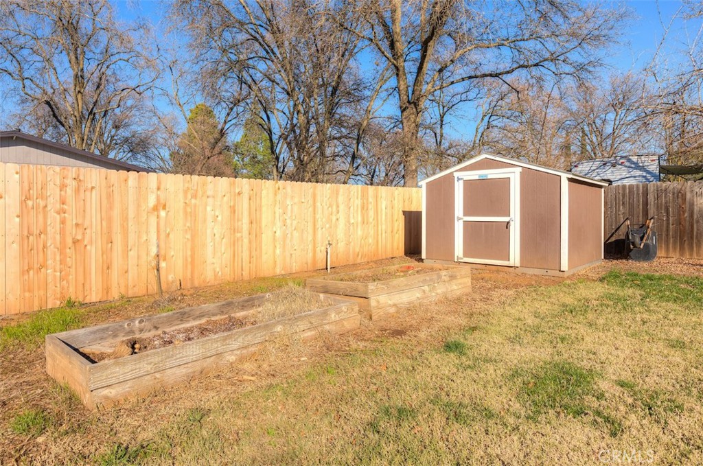 1274 Filbert Avenue Chico, CA 95926 - Photo 35 of 52 a view of a house with backyard and tree