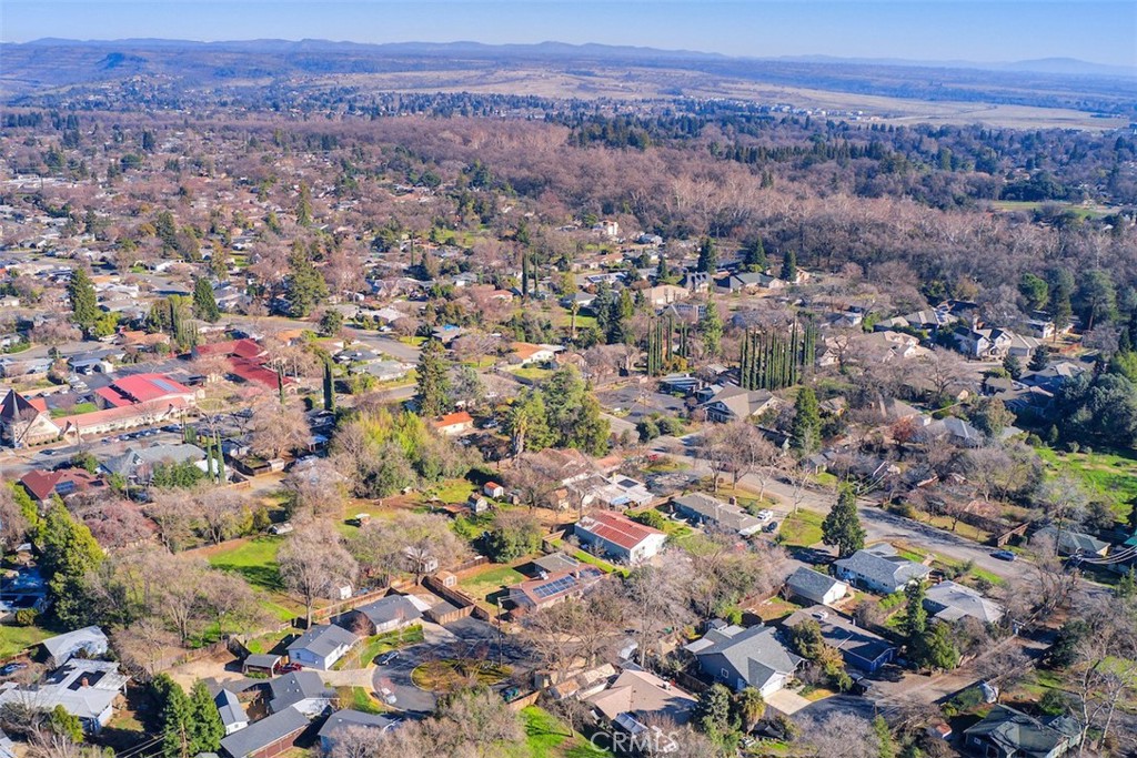 1274 Filbert Avenue Chico, CA 95926 - Photo 48 of 52 an aerial view of a houses with a lush green hillside
