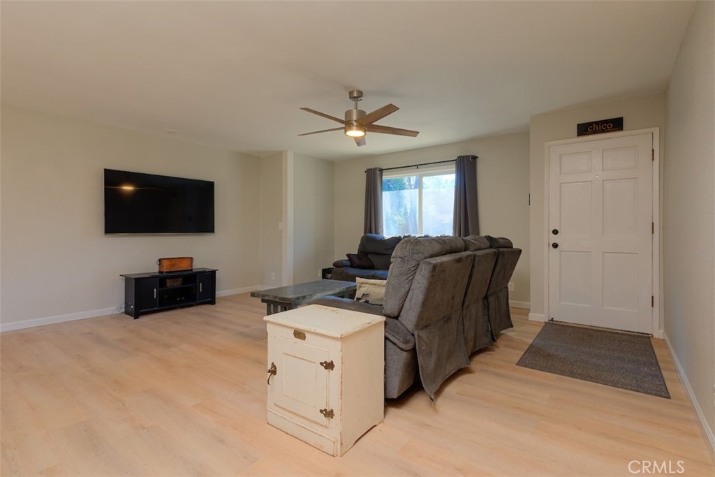 1274 Filbert Avenue Chico, CA 95926 - Photo 5 of 52 a bed room with furniture and a flat screen tv