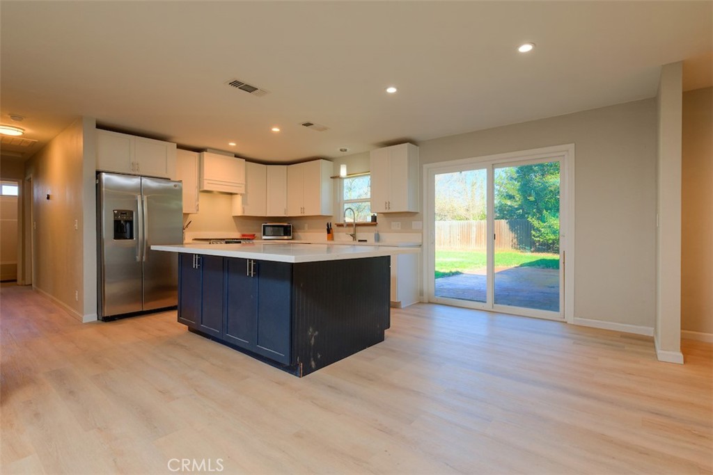1274 Filbert Avenue Chico, CA 95926 - Photo 9 of 52 a kitchen with kitchen island granite countertop a stove and a sink