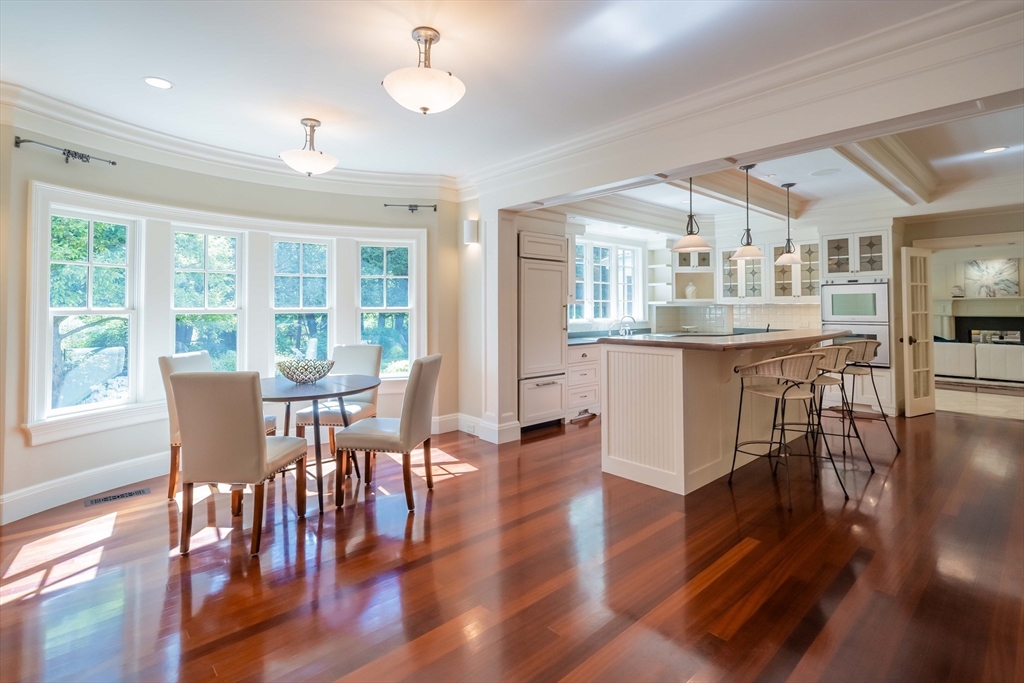 197 Grant Street Lexington, MA 02420 - Photo 11 of 42 a view of a dining room with furniture window and wooden floor