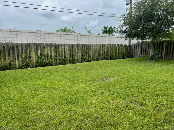 a view of a backyard with a garden