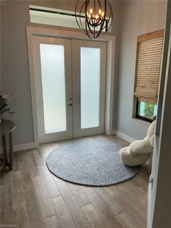 a view of a livingroom with furniture and windows