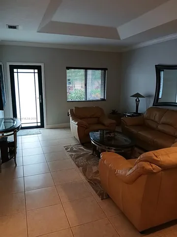 a living room with a couch and a table