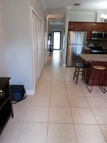 a view of kitchen and entryway