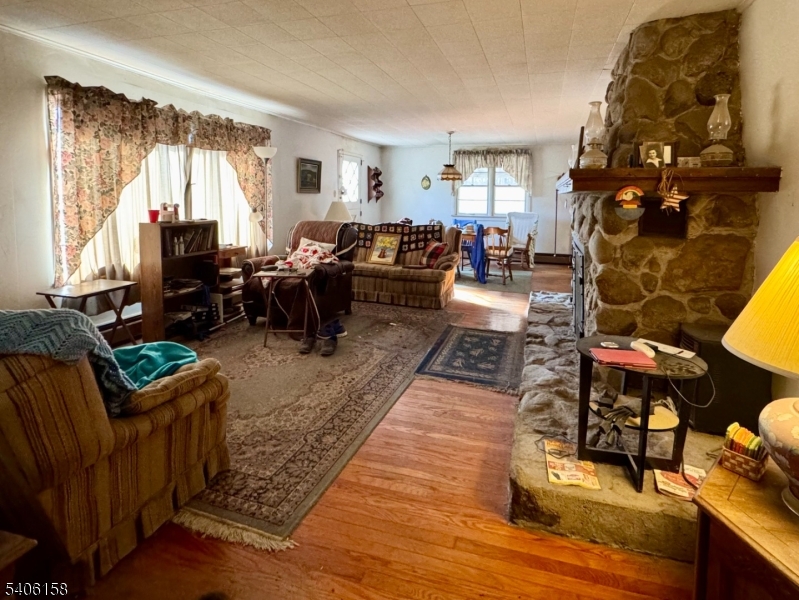 75 Rutherford Drive Belvidere, NJ 07823 - Photo 9 of 16 a living room with furniture or couch and a window