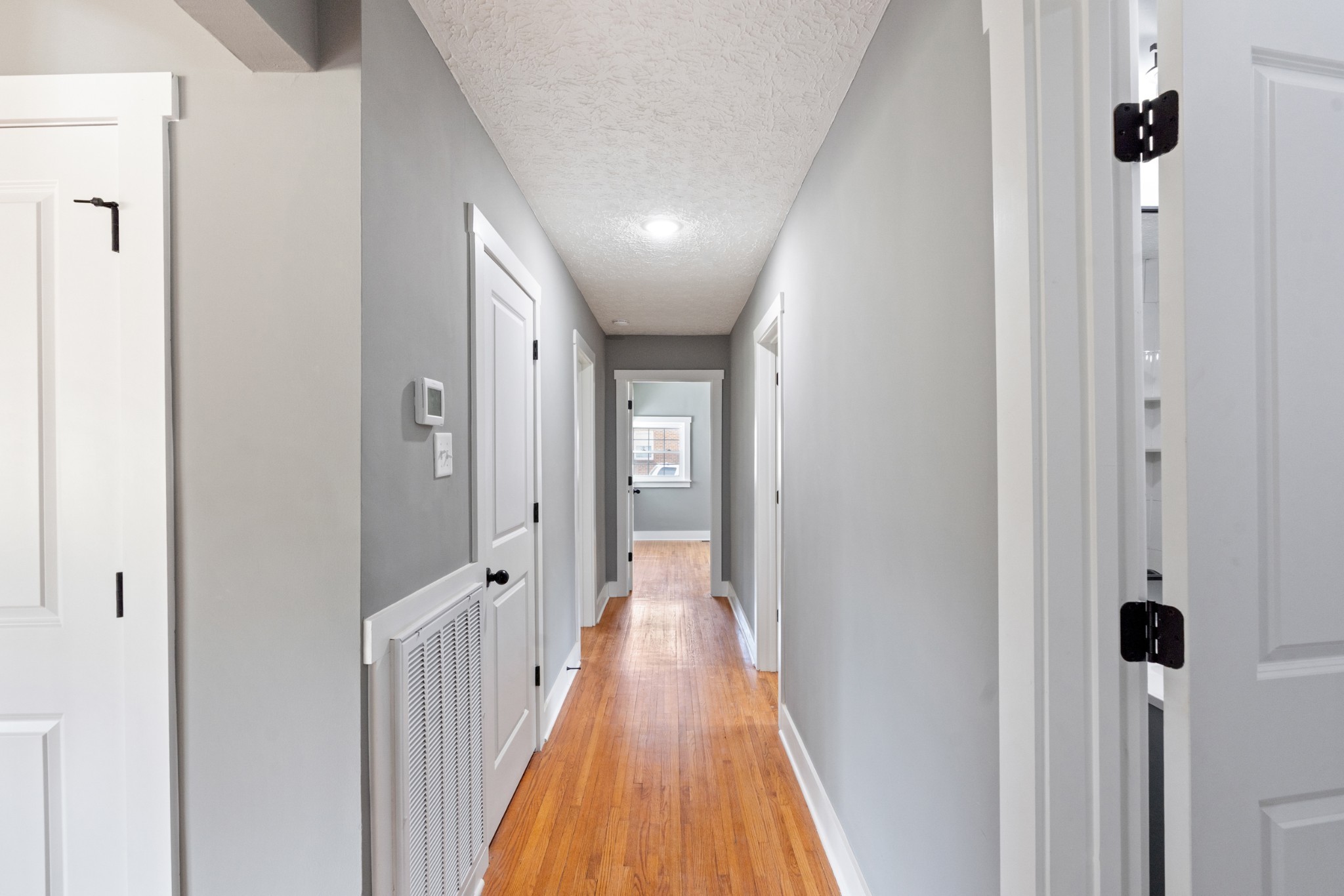 1503 5th Avenue West Springfield, TN 37172 - Photo 26 of 43 a view of a hallway with wooden floor