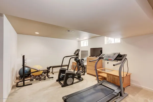 a view of a room with gym equipment