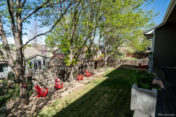 a view of a backyard with a small cabin