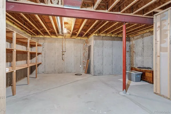 a view of a room with wooden walls