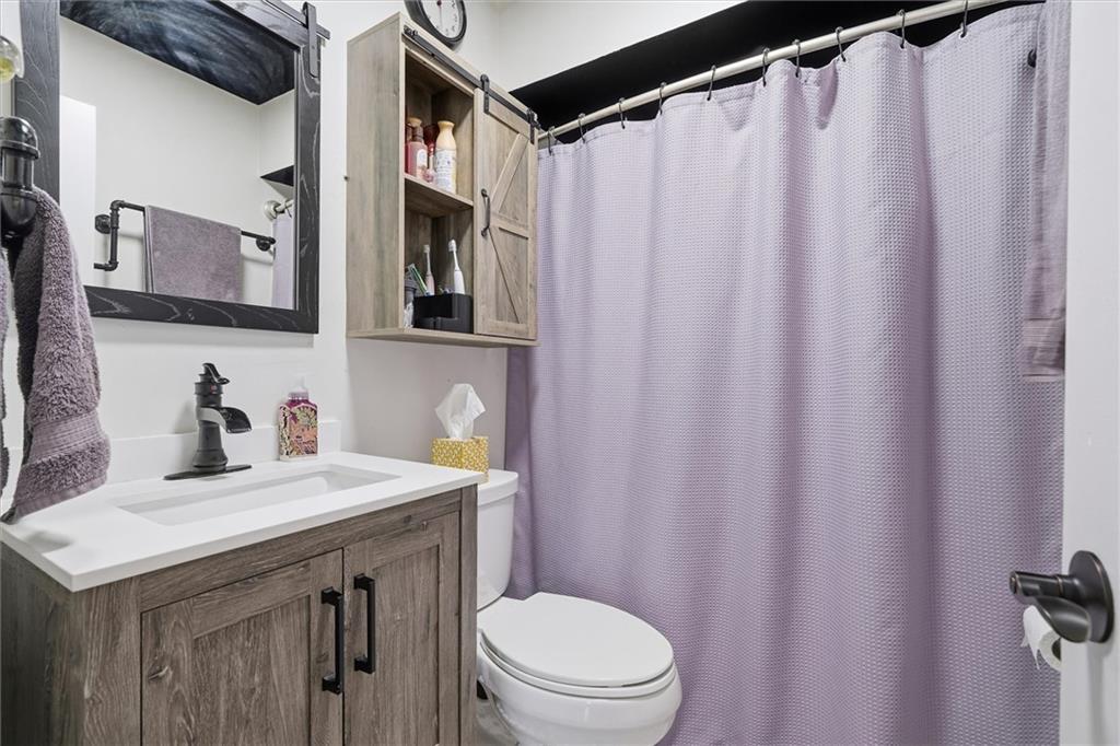 804 Erdner Avenue Pittsburgh, PA 15202 - Photo 17 of 48 a bathroom with a sink a toilet and shower