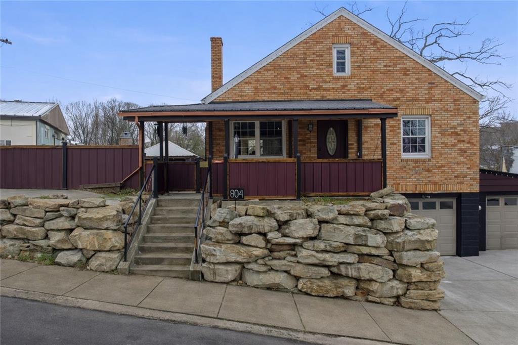 804 Erdner Avenue Pittsburgh, PA 15202 - Photo 2 of 48 a front view of a house with a yard