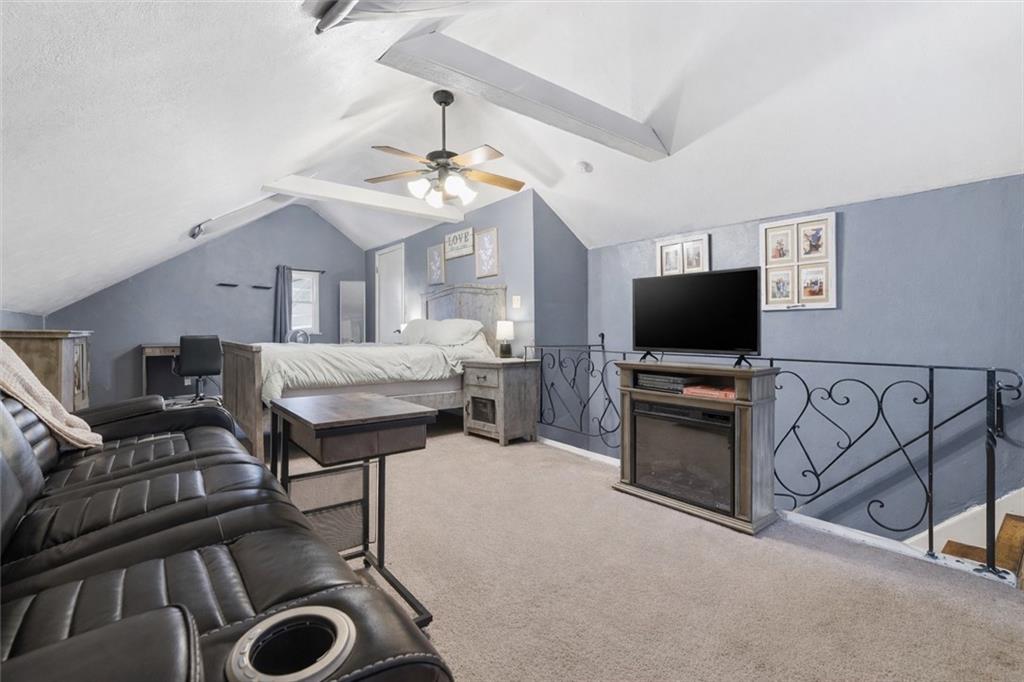804 Erdner Avenue Pittsburgh, PA 15202 - Photo 24 of 48 a bedroom with furniture and a flat screen tv
