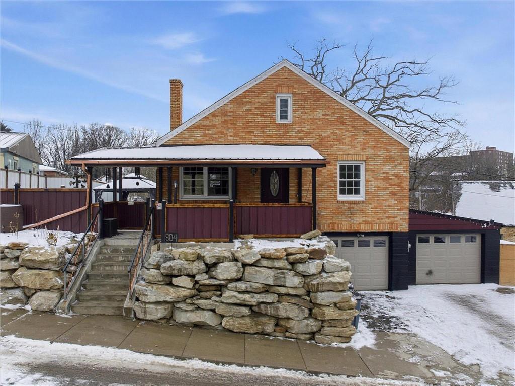 804 Erdner Avenue Pittsburgh, PA 15202 - Photo 45 of 48 a front view of a house with a yard