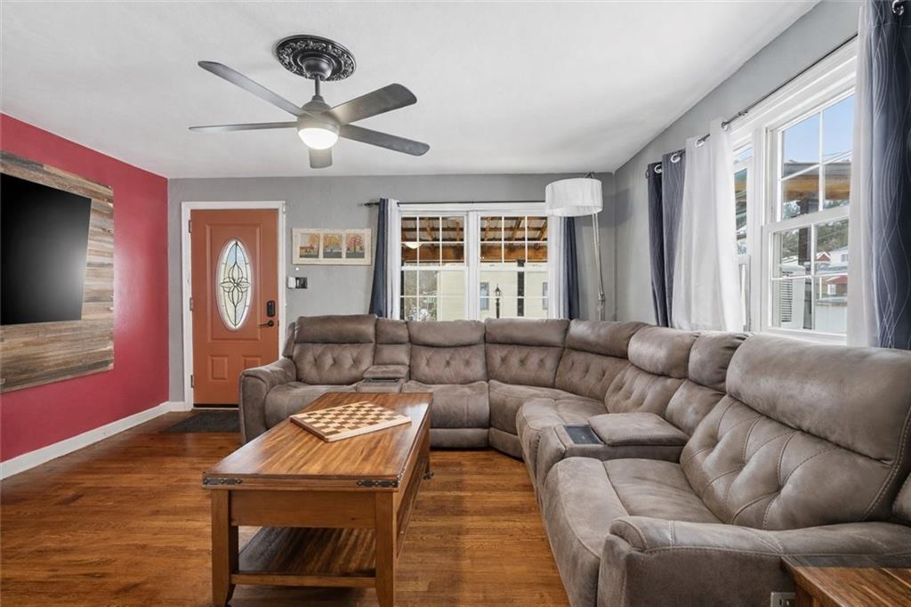 804 Erdner Avenue Pittsburgh, PA 15202 - Photo 5 of 48 a living room with furniture and a large window