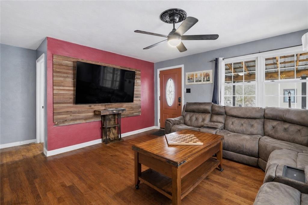 804 Erdner Avenue Pittsburgh, PA 15202 - Photo 6 of 48 a living room with furniture and a flat screen tv