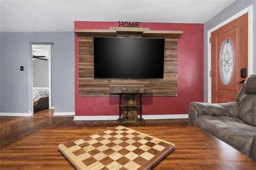 804 Erdner Avenue Pittsburgh, PA 15202 - Photo 7 of 48 a living room with fireplace furniture and a flat screen tv