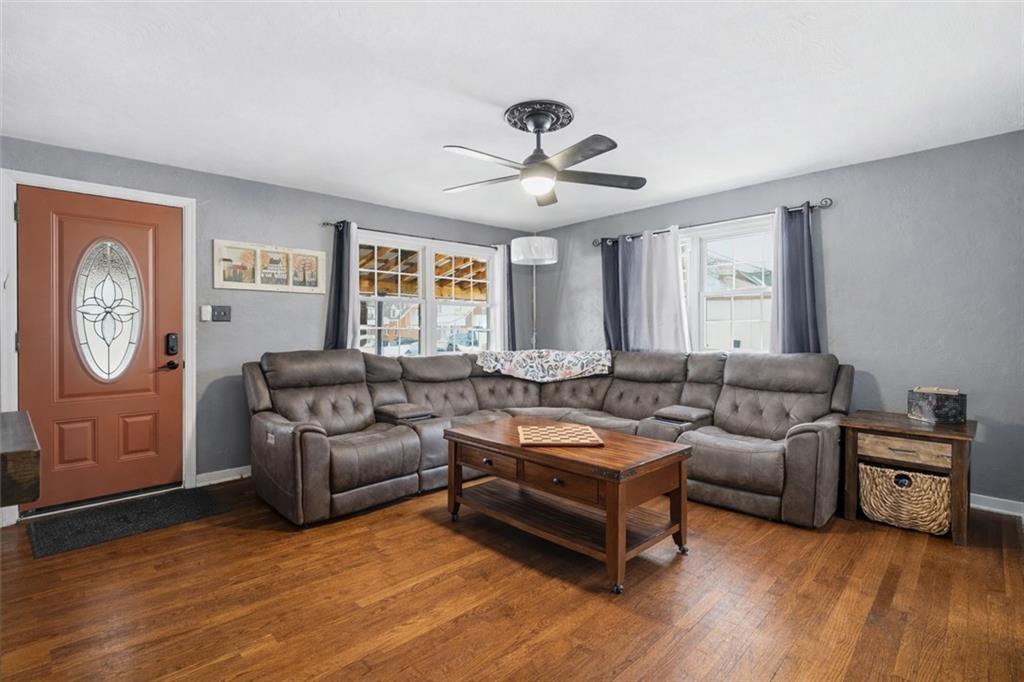 804 Erdner Avenue Pittsburgh, PA 15202 - Photo 8 of 48 a living room with furniture a bed and a window