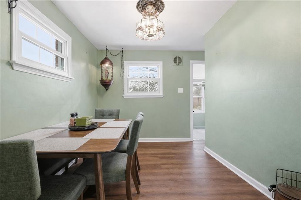 804 Erdner Avenue Pittsburgh, PA 15202 - Photo 10 of 48 a view of a dining room with furniture window and wooden floor