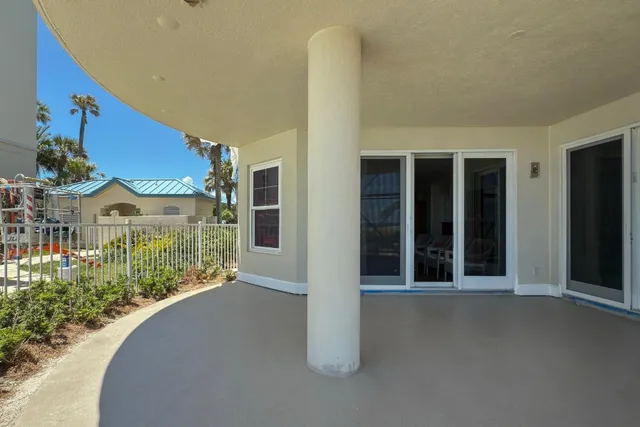 a view of an entrance to house and empty room
