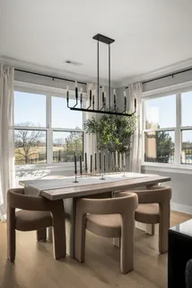 a kitchen with stainless steel appliances granite countertop a stove and a sink