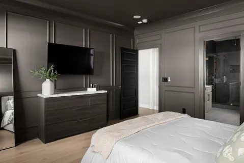 a bathroom with a shower sink and mirror