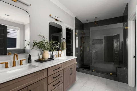 a bathroom with a shower and a sink