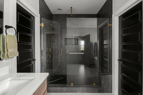 a bathroom with a bathtub and a sink