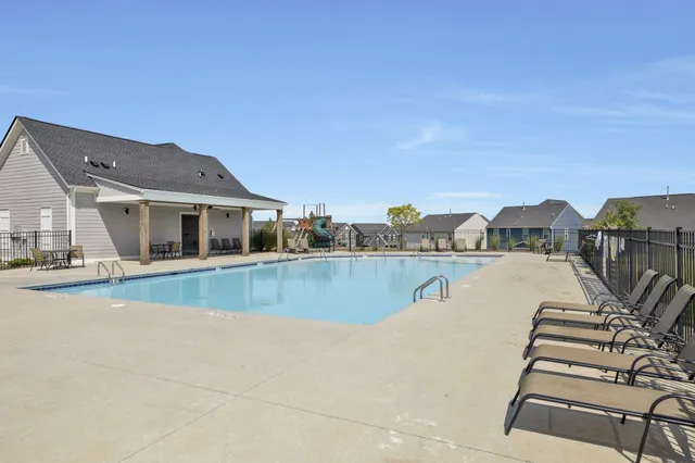 a view of house with outdoor space and river