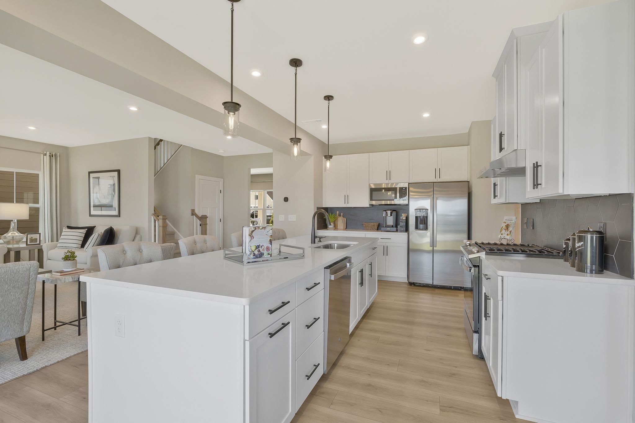 931 Green Valley Smyrna, TN 37167 - Photo 6 of 22 a kitchen with white cabinets sink and stainless steel appliances