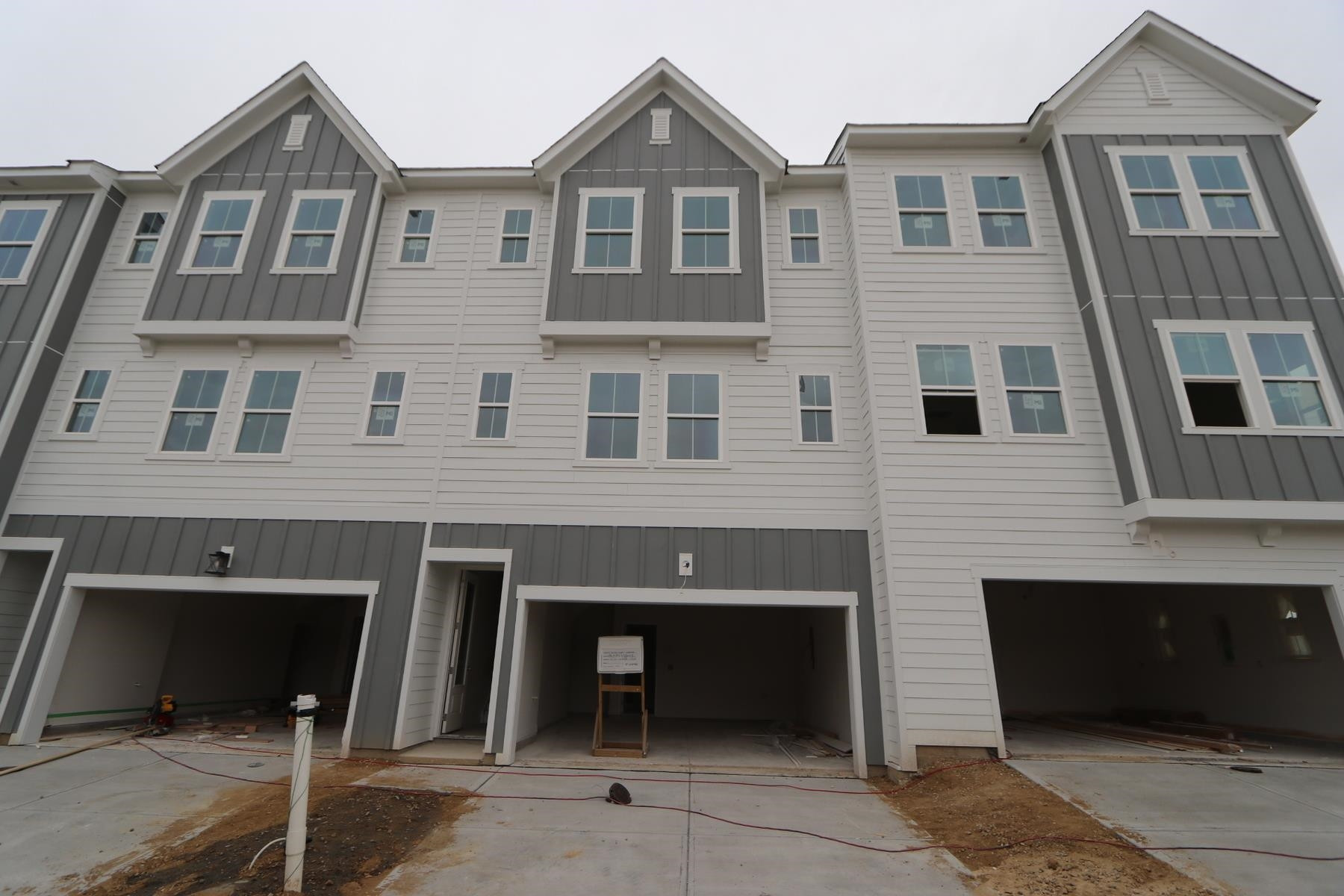 a front view of a house with a garage