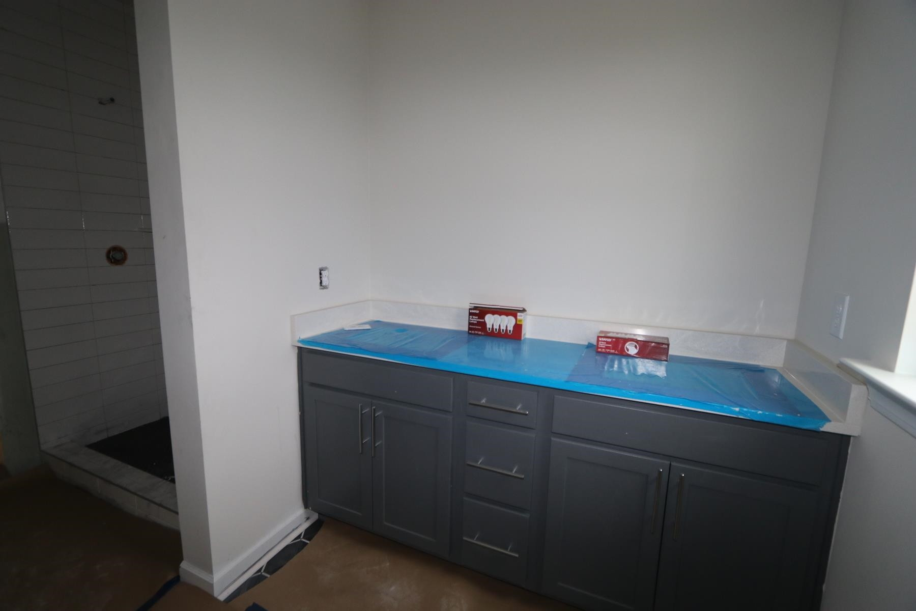 816 Lilyquist Way Wake Forest, NC 27587 - Photo 5 of 6 a room with a sink and cabinets