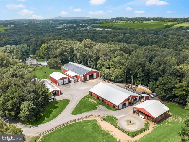 an aerial view of a house with a garden