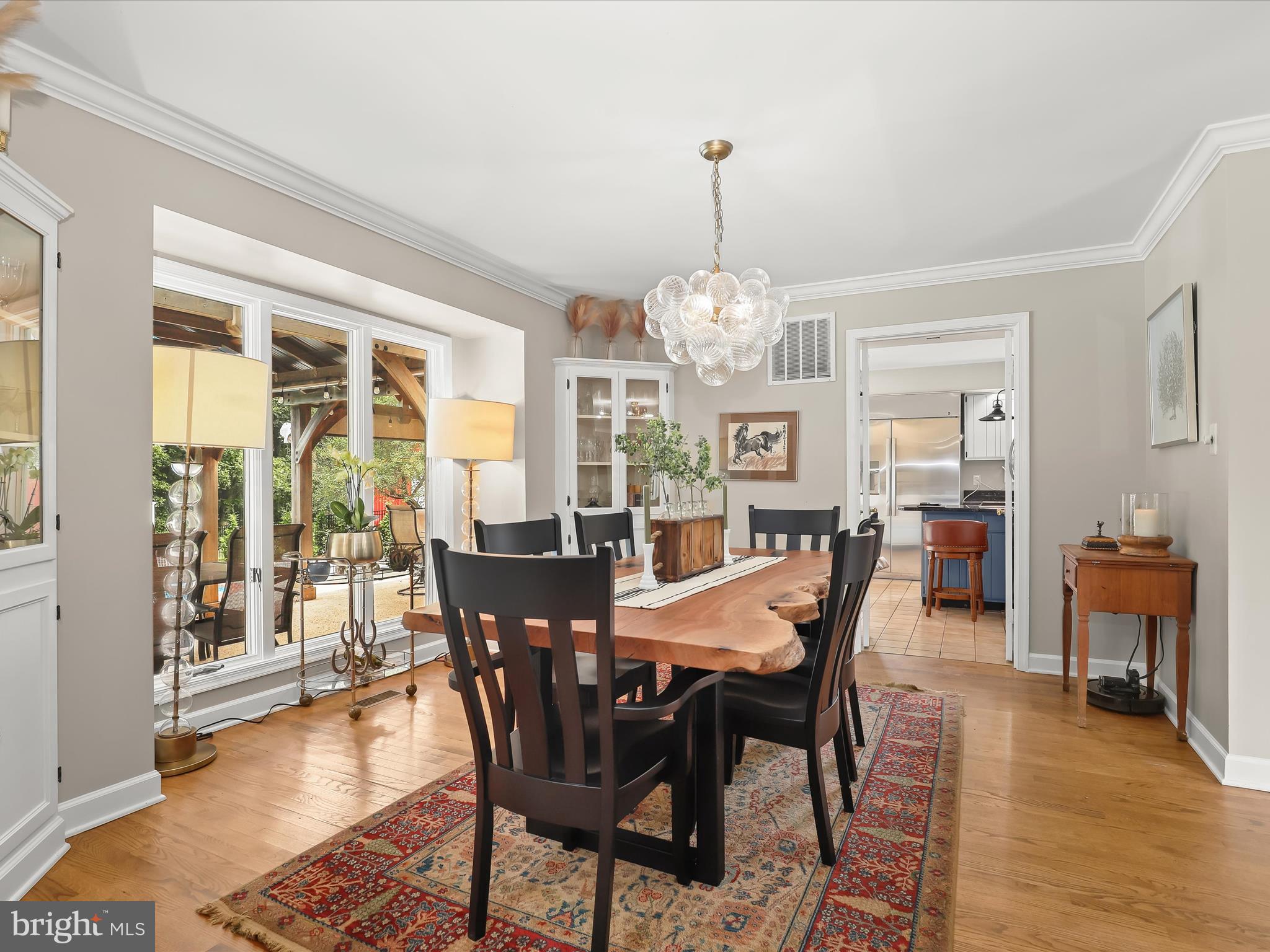 10901 Moxley Road Damascus, MD 20872 - Photo 16 of 148 a view of a dining room with furniture window and wooden floor