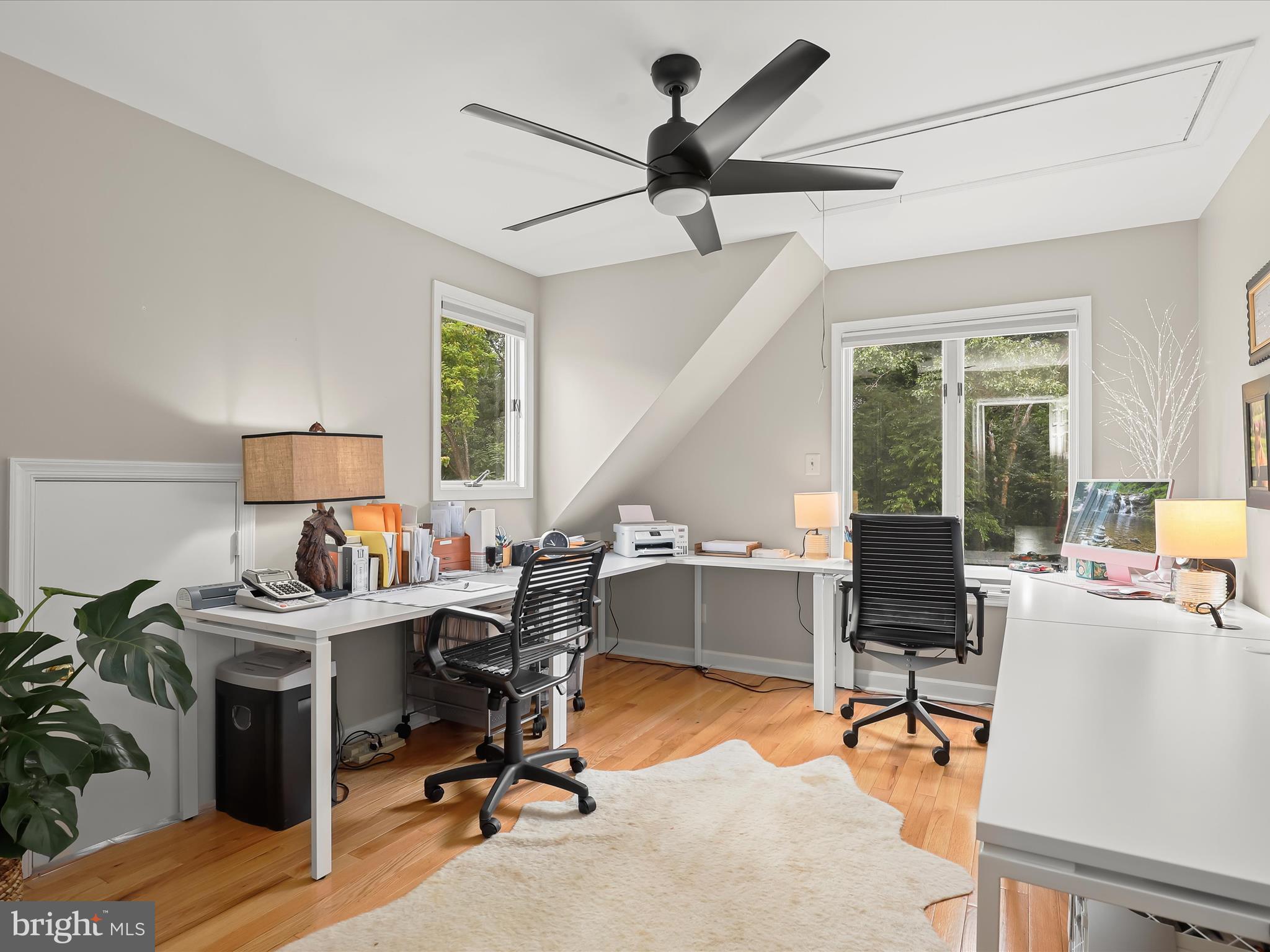 10901 Moxley Road Damascus, MD 20872 - Photo 44 of 148 a view of a workspace with furniture and a window
