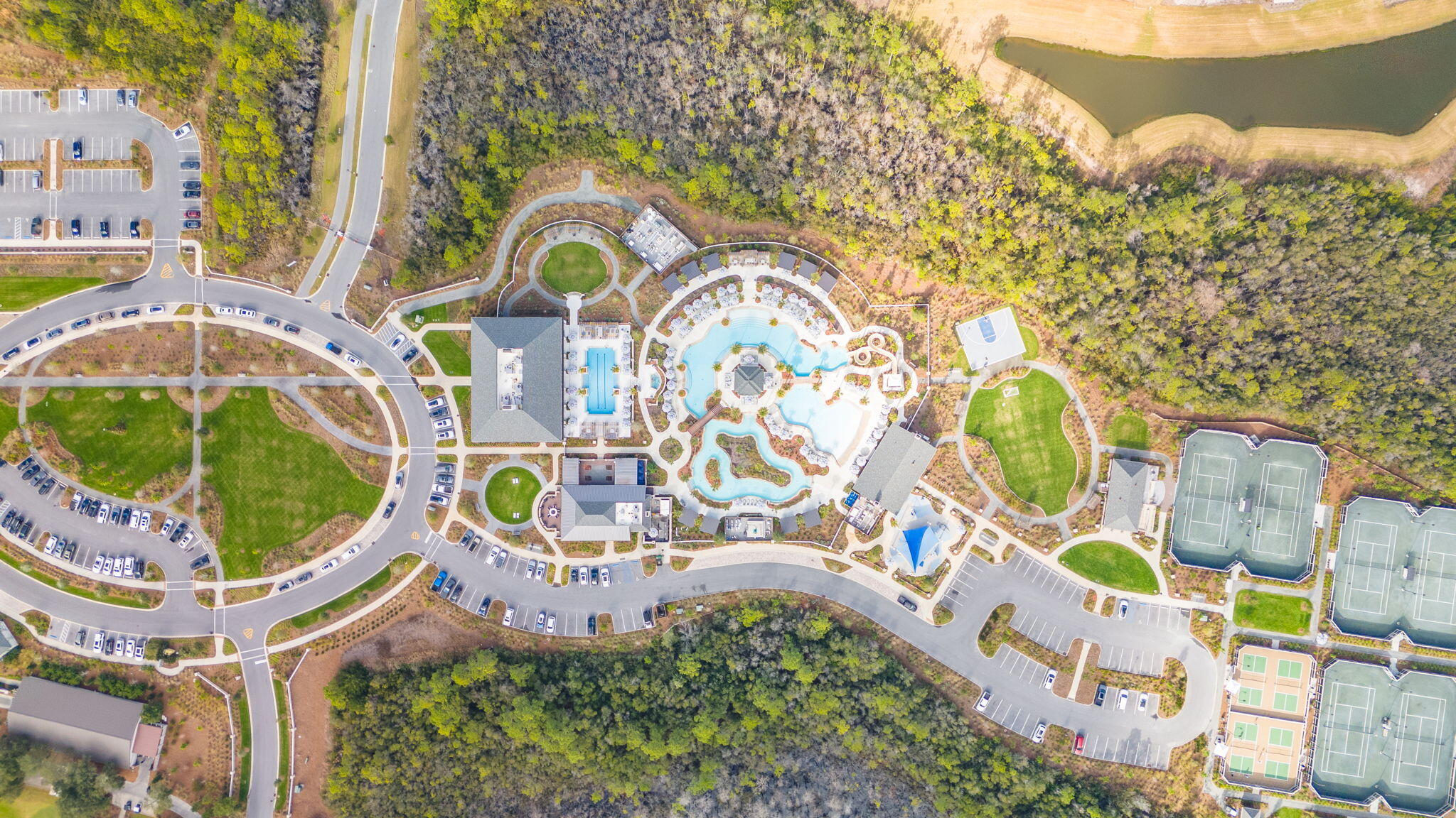 Lot 232 Quail Hollow Inlet Beach, FL 32461 - Photo 13 of 21 a building with swimming pool and next to trees