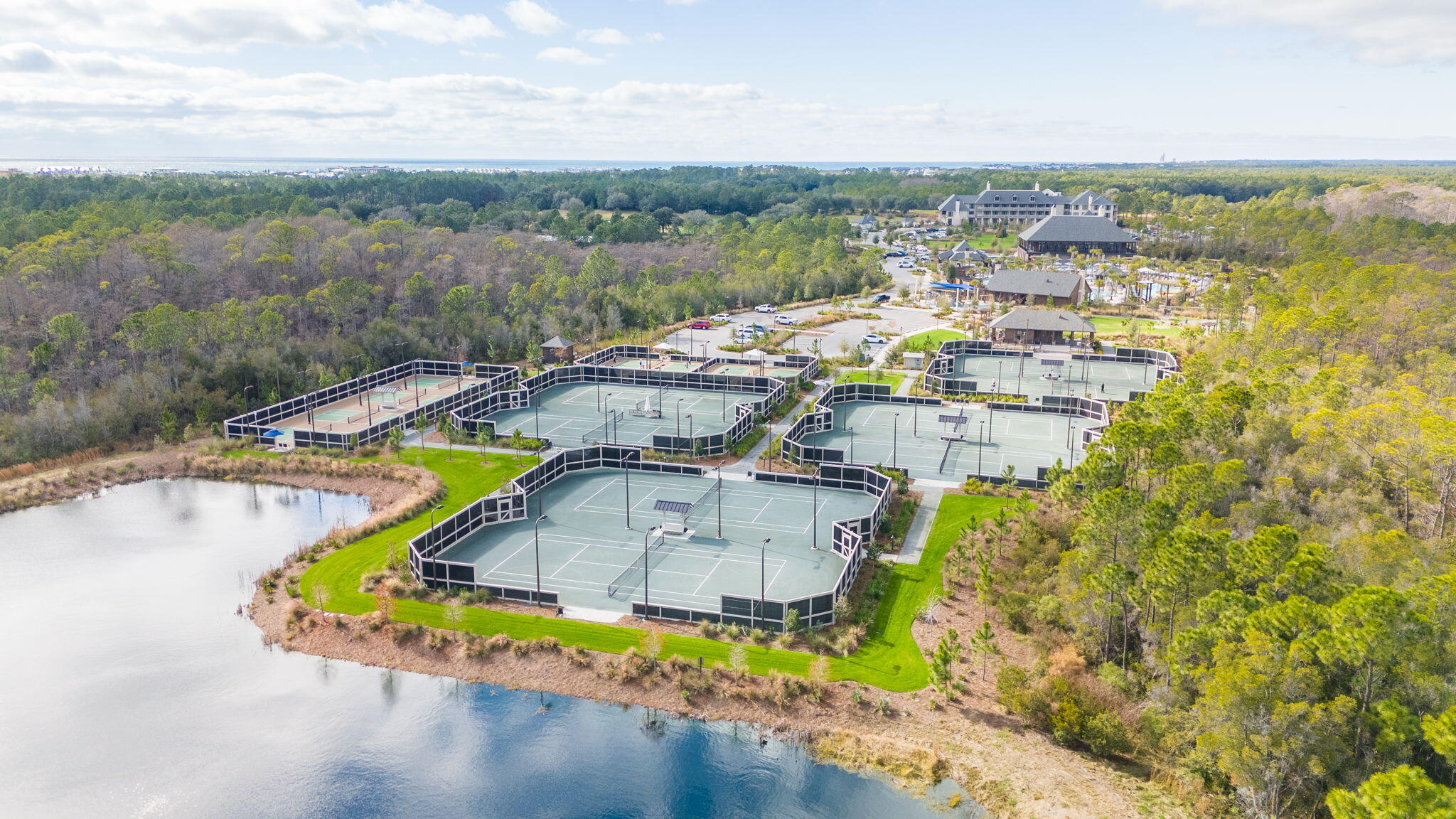 Lot 232 Quail Hollow Inlet Beach, FL 32461 - Photo 17 of 21 an aerial view of a house with a swimming pool and lake view