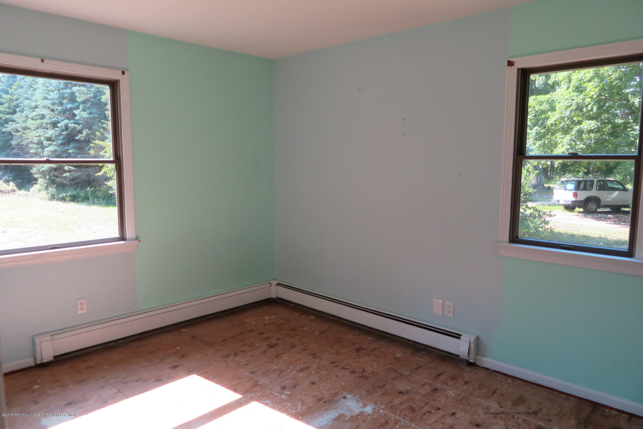 310 Colts Neck Road Farmingdale, NJ 07727 - Photo 11 of 15 an empty room with a window